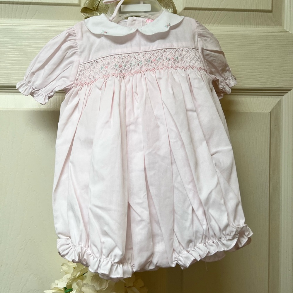 New baby romper with tag. Size: 3 months